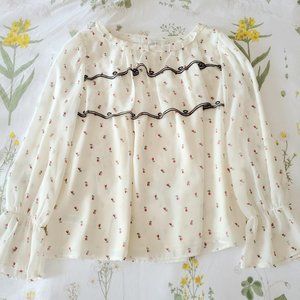 white floral puff long sleeve blouse